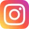 Instagram logo featuring a white camera outline centred on a gradient background of orange, pink, and purple.